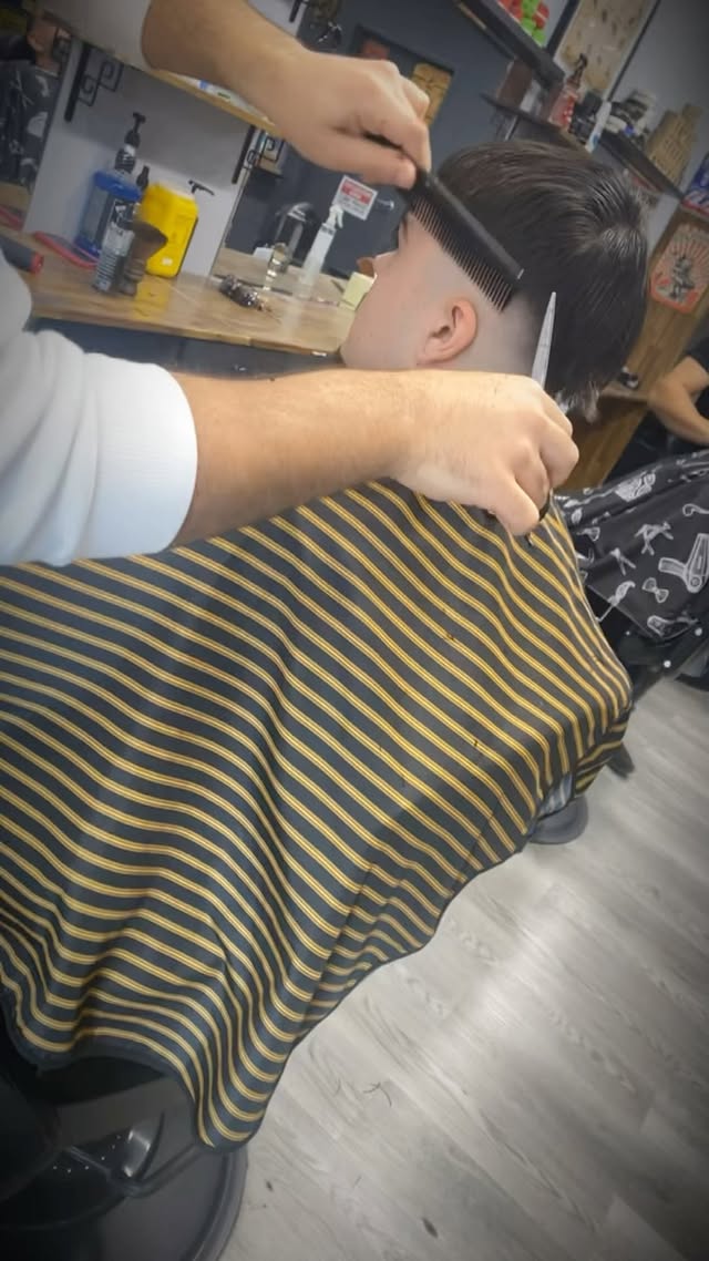 Sharp fade and beard combo